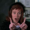 The 1995 teen movie Clueless popularized terms like "whatever" — including the gesture — shown here in a still featuring Elisa Donovan as Amber.