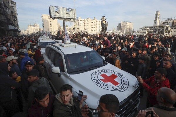A Red Cross convoy arrives to collect Israeli hostages who were released after a ceasefire agreement between Israel and Hamas took effect, in Gaza City, Jan. 19, 2025. (AP Photo/Abed Hajjar, File)