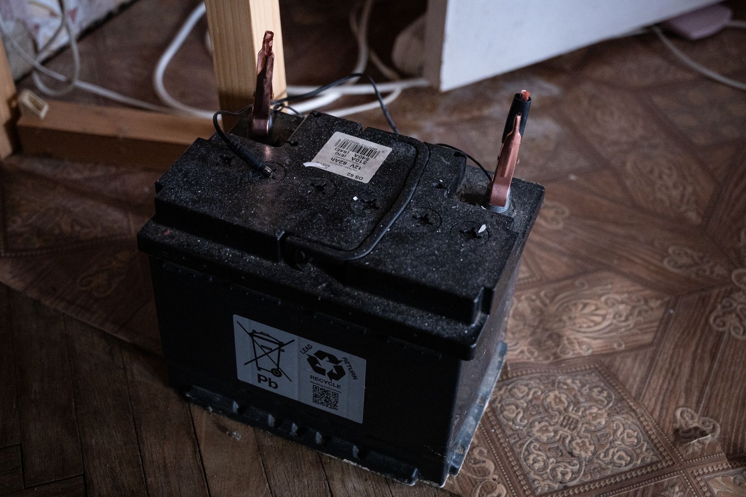 A car battery used as a power source during outages is seen in Daria’s apartment in Kyiv, Ukraine, on Jan. 27, 2026.