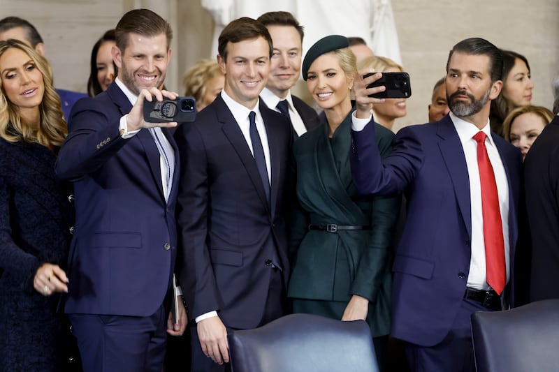 WASHINGTON, DC - JANUARY 20: (L-R) Lara Trump, Eric Trump, Jared Kushner, Elon Musk, Ivanka Trump, and Donald Trump Jr. pose for photos after the inauguration of President Donald Trump in the U.S. Capitol Rotunda on January 20, 2025 in Washington, DC. Donald Trump takes office for his second term as the 47th President of the United States. (Photo by Shawn Thew-Pool/Getty Images)