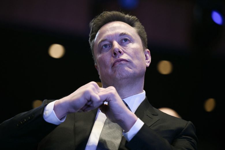Elon Musk looks on as President Donald Trump speaks at the US-Saudi Investment Forum.