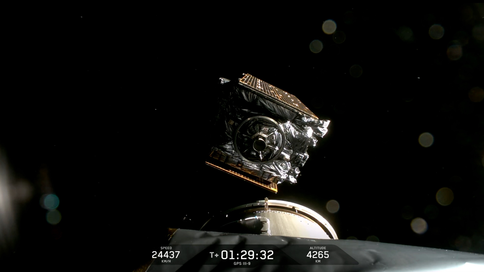 a boxy satellite deploys into orbit from a rocket's upper stage