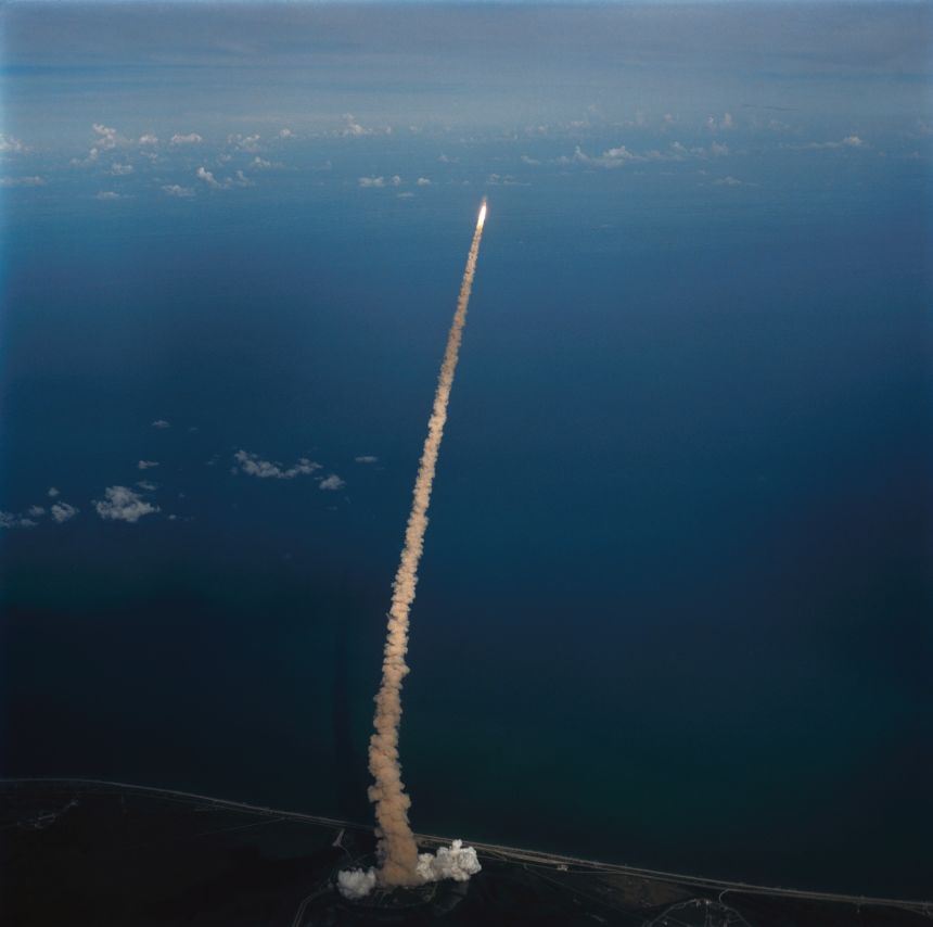 This July 29, 1985 photo shows the Space Shuttle orbiter Challenger moments after launch from Pad 39A at Kennedy Space Center.