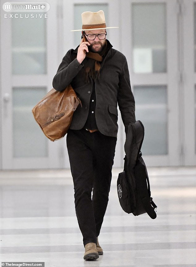 The 59-year-old star of Designated Survivor and the 24 series was booked for suspicion of felony criminal threats after police say he assaulted the rideshare driver in Los Angelesand got into the car without consent