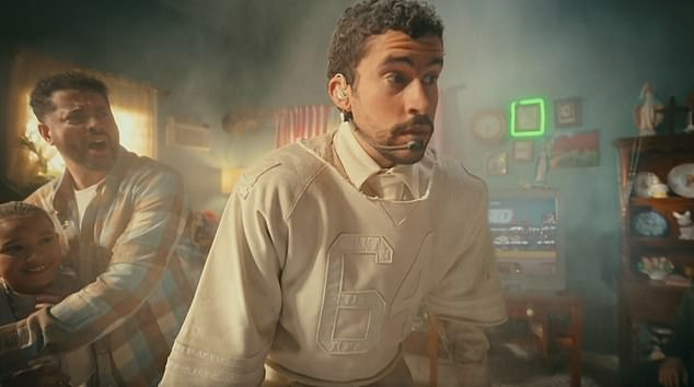 In an amusing prerecorded segment, Bad Bunny appeared to fall through the building roof into the living room of a shocked family