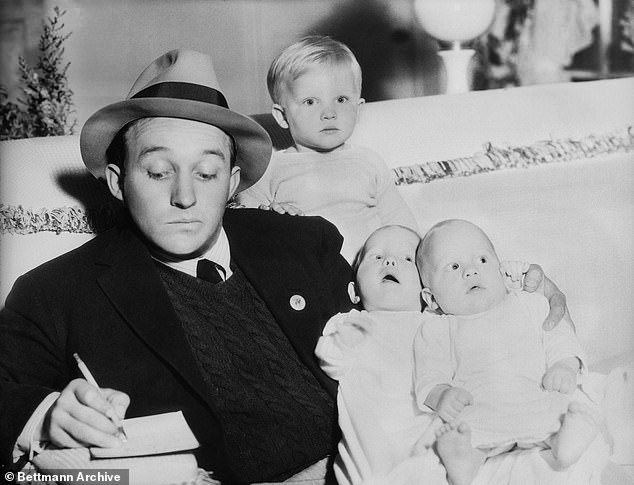 Bing Crosby with sons Gary Evans (standing) and Phillip Lang and Dennis Michael, twins