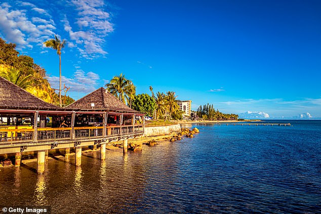The beach, near the capital Nouméa was 'particularly busy' over the weekend, despite a serious shark attack on a 49-year-old days before that left them seriously injured. Officials warn against sharks on the tourism board website