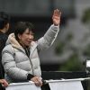 Japan's Prime Minister and President of the Liberal Democratic Party (LDP) Sanae Takaichi (R) waves to the people upon her arrival to deliver a campaign speech ahead of the House of Representatives election, at Rekisen Park in Tokyo on February 7, 2026.