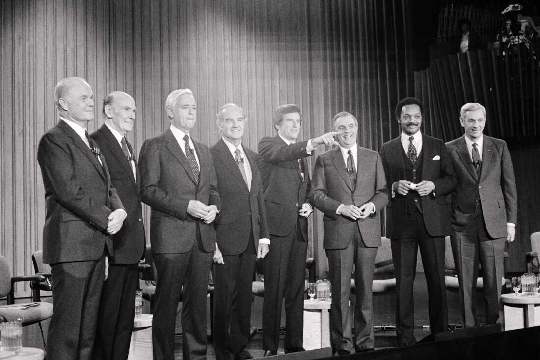 The 1984 Democratic Presidential candidates pose for photographers prior to the Democratic debate at Darmouth College. (L-R) John Glenn, Alan Cranston, Ernest Hollings, George McGovern, Gary Hart, Walter Mondale, Jesse Jackson, and Reubin Askew.