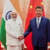 In this photo provided by Indian Prime Minister's Office, Indian Prime Minister Narendra Modi, left, and Chinese President Xi Jinping shake hands before their meeting on the sidelines of the Shanghai Cooperation Organization (SCO) summit in Tianjin, China Sunday, Aug. 31, 2025.