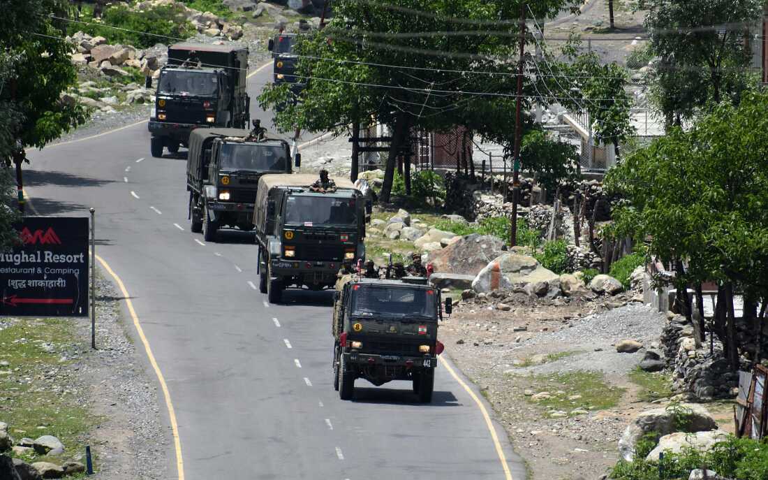An Indian army convoy move along the Srinagar-Leh National Highway toward Ladakh on June 17, 2020. At least 20 Indian soldiers were killed in a violent clash with Chinese forces in a disputed border area.