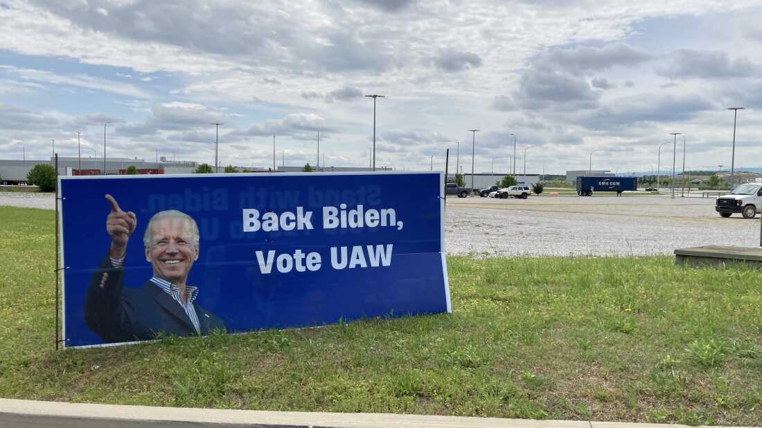 Anti-union Volkswagen workers in Chattanooga, Tenn. set up signs outside the assembly plant connecting UAW support to then President Joe Biden in a red state on April 20, 2024.