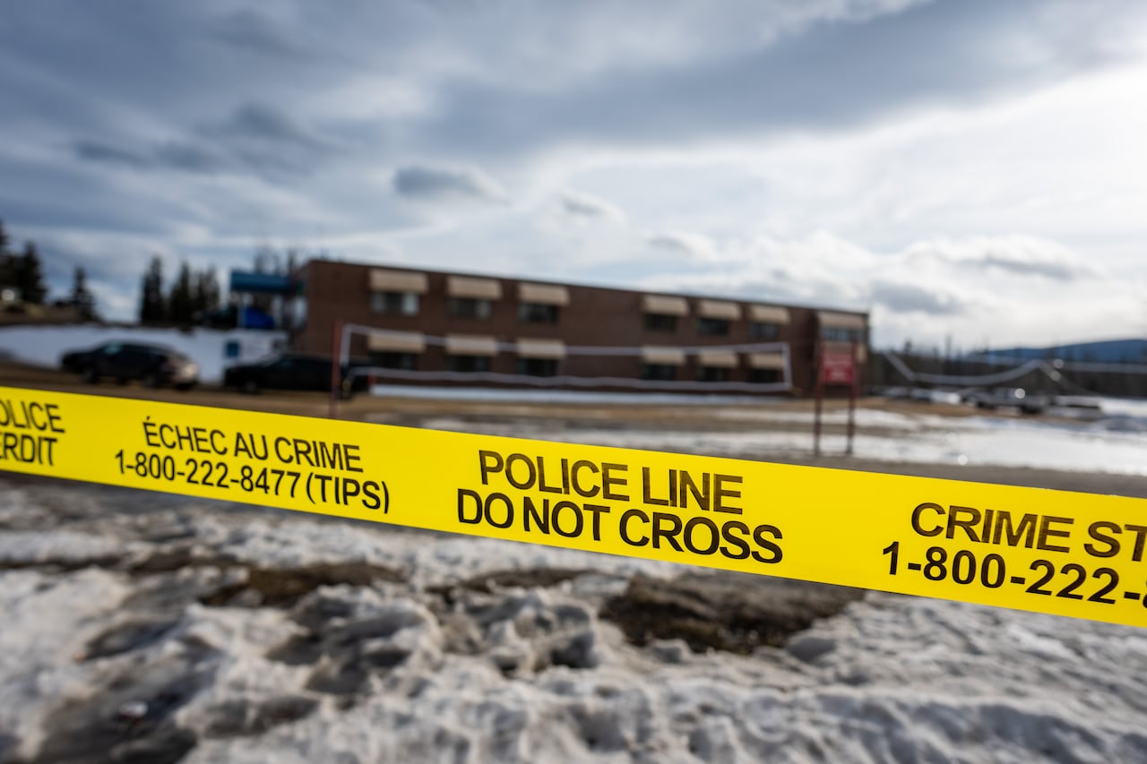 Police tape in front of Tumbler Ridge Secondary School
