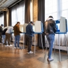 Voters fill out their ballots at a polling place on Election Day, Nov. 4, in Minneapolis, Minn.