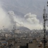 Smoke rises over Tehran after Israel launched airstrikes on Iran on Saturday.