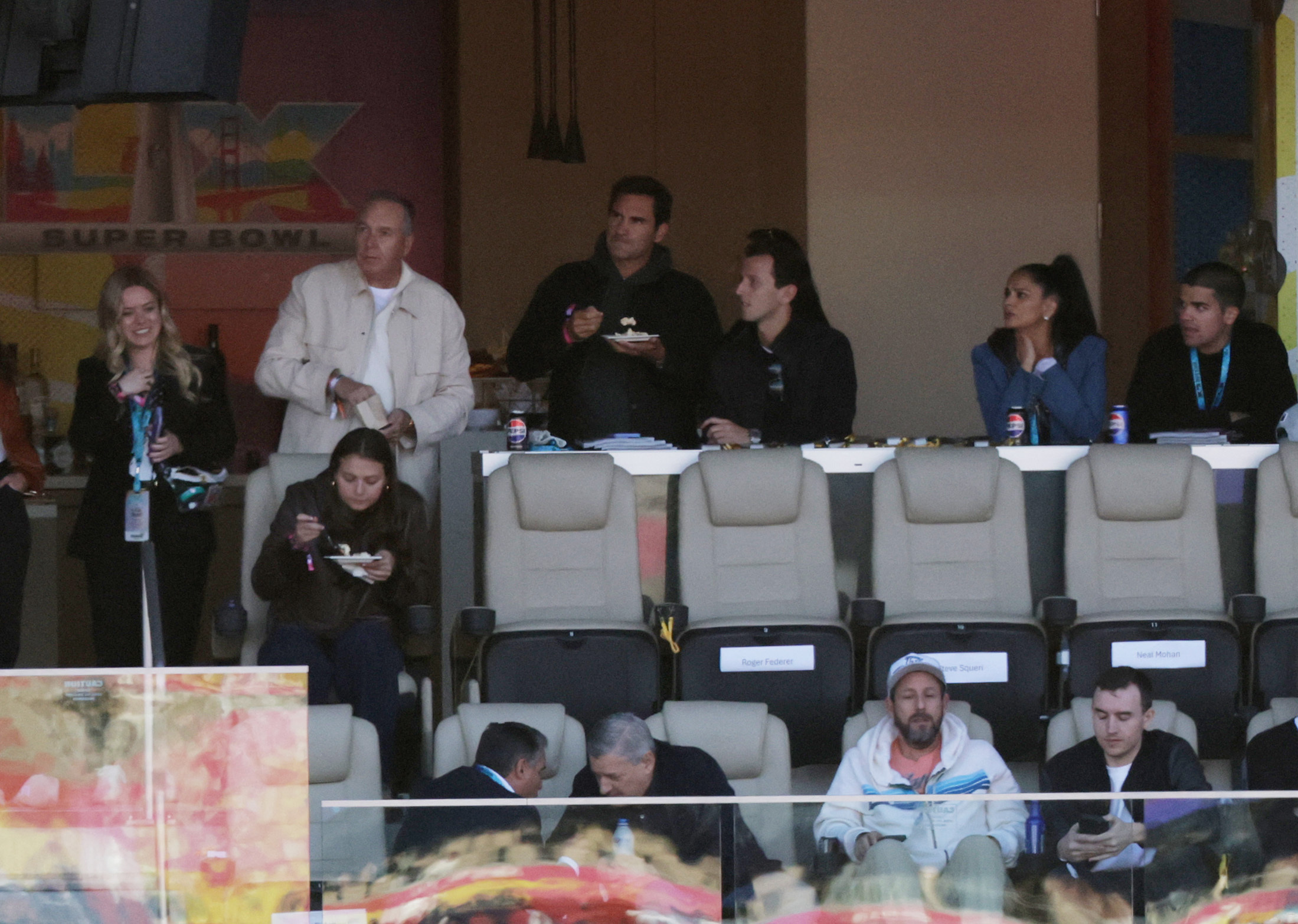 Roger Federer and Adam Sandler attend Super Bowl 60n in a suite