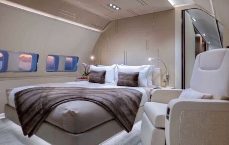 A bedroom inside of a plane