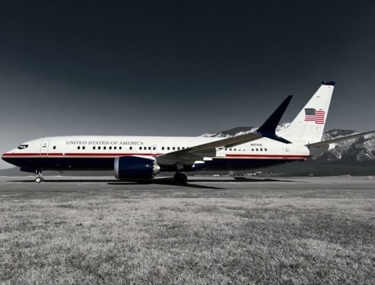 A plane is parked on the tarmac
