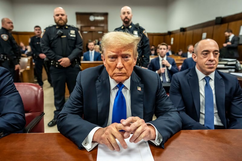 President Donald Trump with attorney Emil Bove attends his criminal trial at Manhattan Criminal Court on May 30, 2024 in New York City.