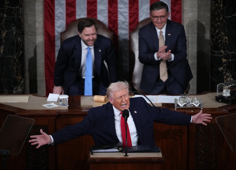 Donald Trump, with JD Vance and Speaker of the House Mike Johnson looking on, delivers his State of the Union address during a Joint Session of Congress at the U.S. Capitol on February 24, 2026.