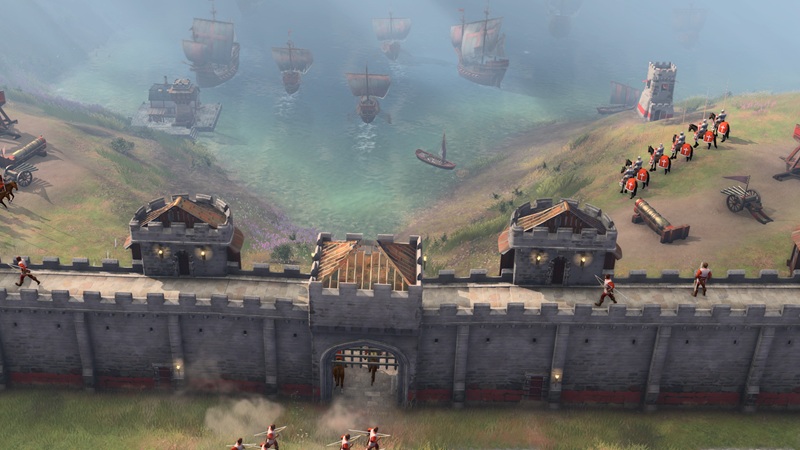 Age of Empires 4 Screenshot of a wall overlooking the sea, with ships on the harbor
