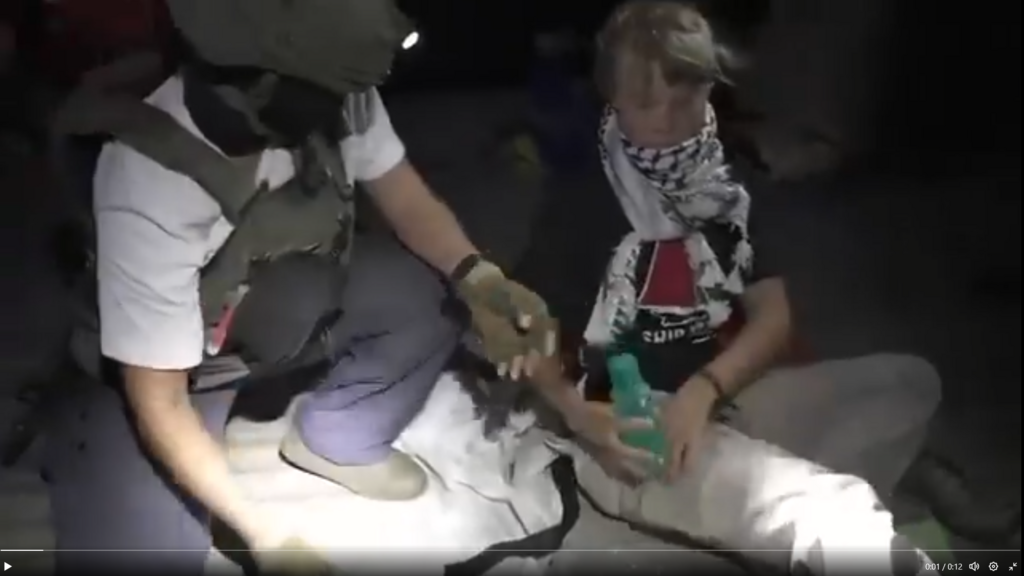 Greta Thunberg after being detained by the Israeli Navy during the previous flotilla in October (Photo: X) כוחות חיל הים לצד גרטה טונברג