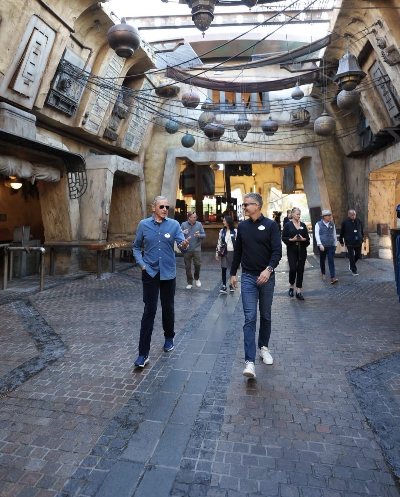 Bob Iger and Josh D'Amaro walk through Star Wars: Galaxy's Edge at Disneyland