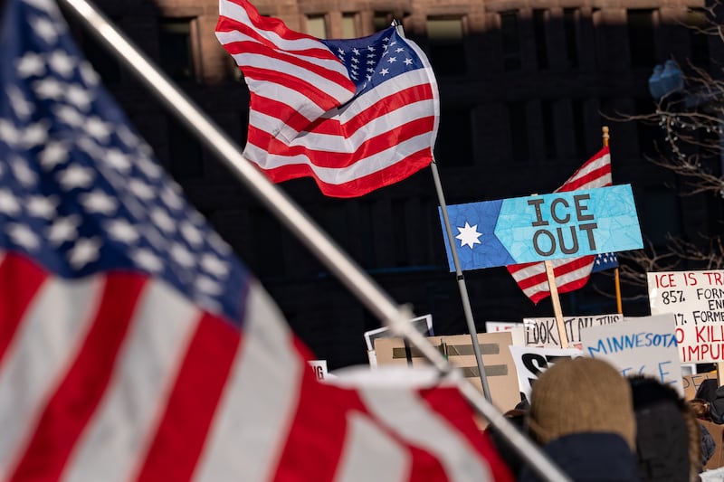 MINNEAPOLIS, MN, UNITED STATES - 2026/01/31: Protesters carry signs and flags as they march against Immigration and Customs Enforcement (ICE). It is the second general strike in two weeks as the city protests ICE operations and the killing of Renee Good and Alex Pretti.