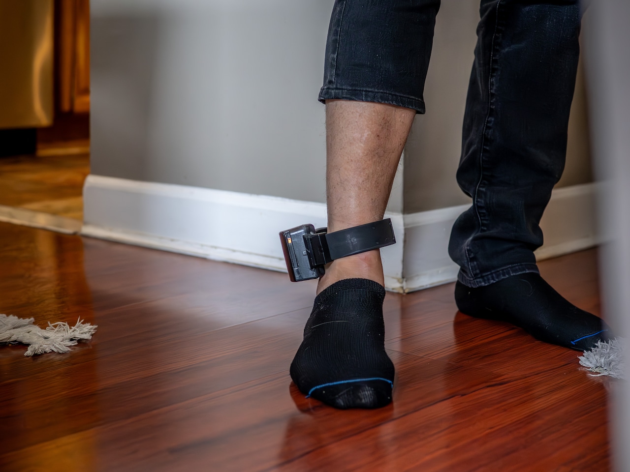 After weeks in detention centers, this man is not fully free