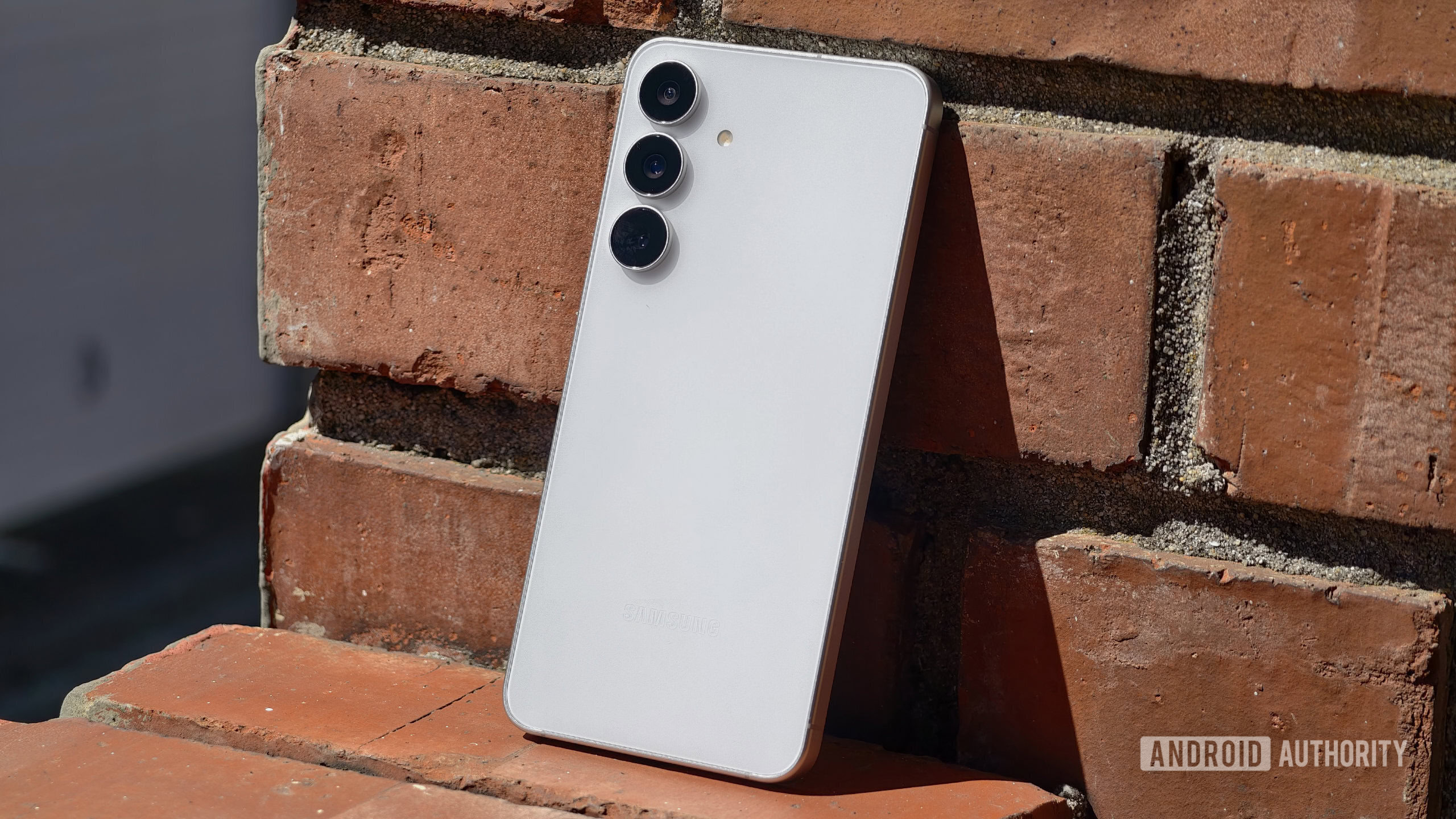 Samsung Galaxy S25 FE against wall showing back Samsung Galaxy S25 FE against wall showing back