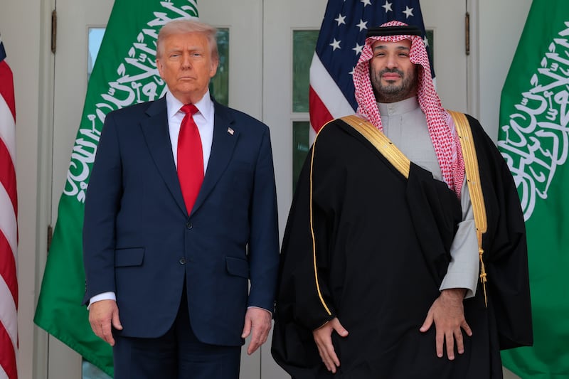 WASHINGTON, DC - NOVEMBER 18: U.S. President Donald Trump (L) and Crown Prince and Prime Minister Mohammed bin Salman of Saudi Arabia pause for photographs along the West Wing Colonnade at the White House on November 18, 2025 in Washington, DC.  The two leaders held meetings aimed at strengthening economic and defense ties, including the sale of F-35 fighter jets to Saudi Arabia.  (Photo by Chip Somodevilla/Getty Images)
