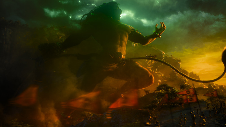 A giant Hindu god runs into battle with a massive army in Varanasi