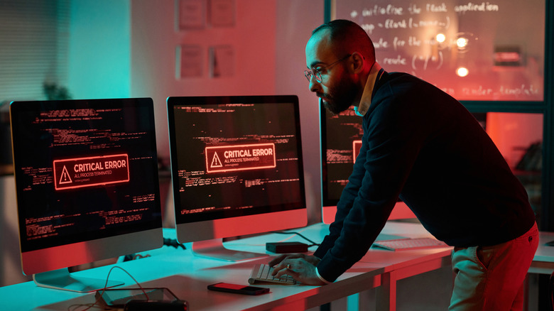 Artistic rendition of a computer virus attacking a system