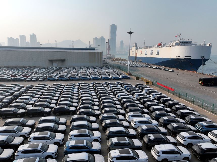 Aerial view of new vehicles waiting for shipment to overseas markets in a port in Lianyungang in eastern China.