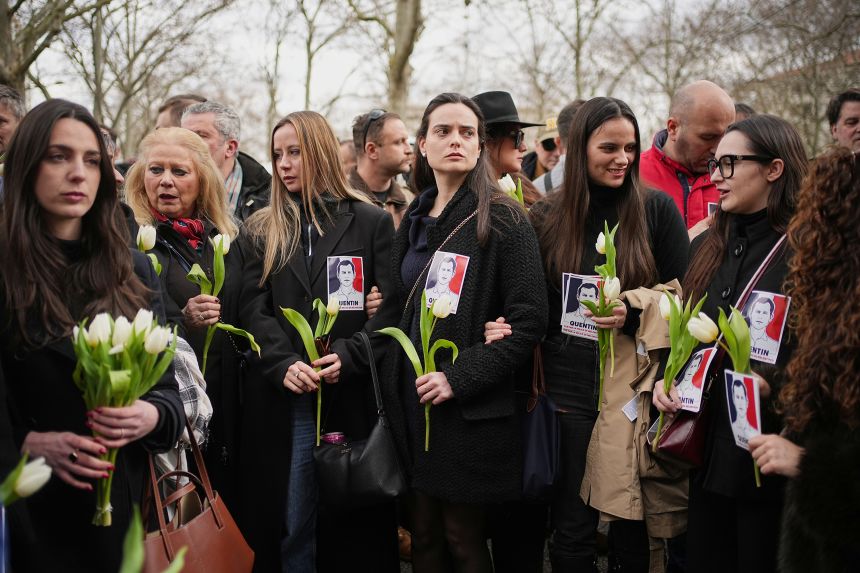 Alice Cordier, third left, French far-right activist president of the identitarian group Collectif Némésis, takes part in a march in Lyon, France, Saturday to Deranque.