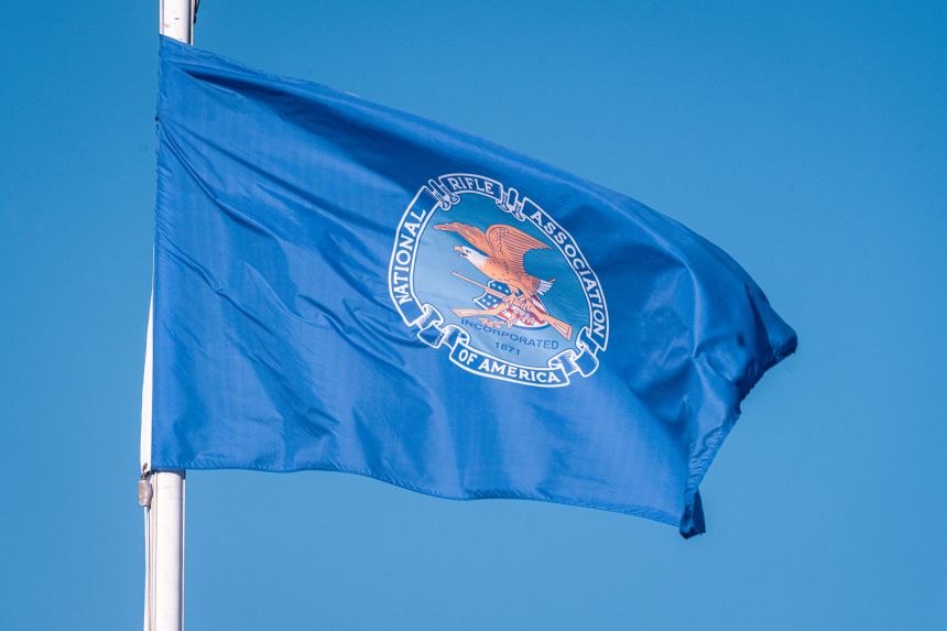 The National Rifle Association of America flag flies above the headquarters building on December 3, 2024, in Fairfax, Virginia.
