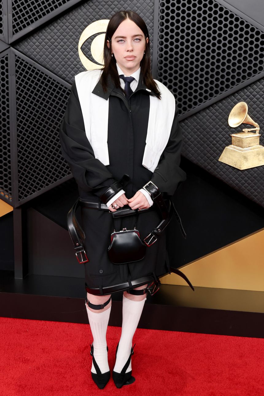 Billie Eilish’s look, by Hodakova, cleverly deconstructed menswear tailoring, with suit pants seemingly transformed into a jacket and skirt.