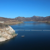 The San Vicente reservoir in San Diego County stores water from as far away as the Colorado River. Pumping water into a smaller reservoir in the surrounding mountains could store excess solar power until it's needed, when the sun sets.