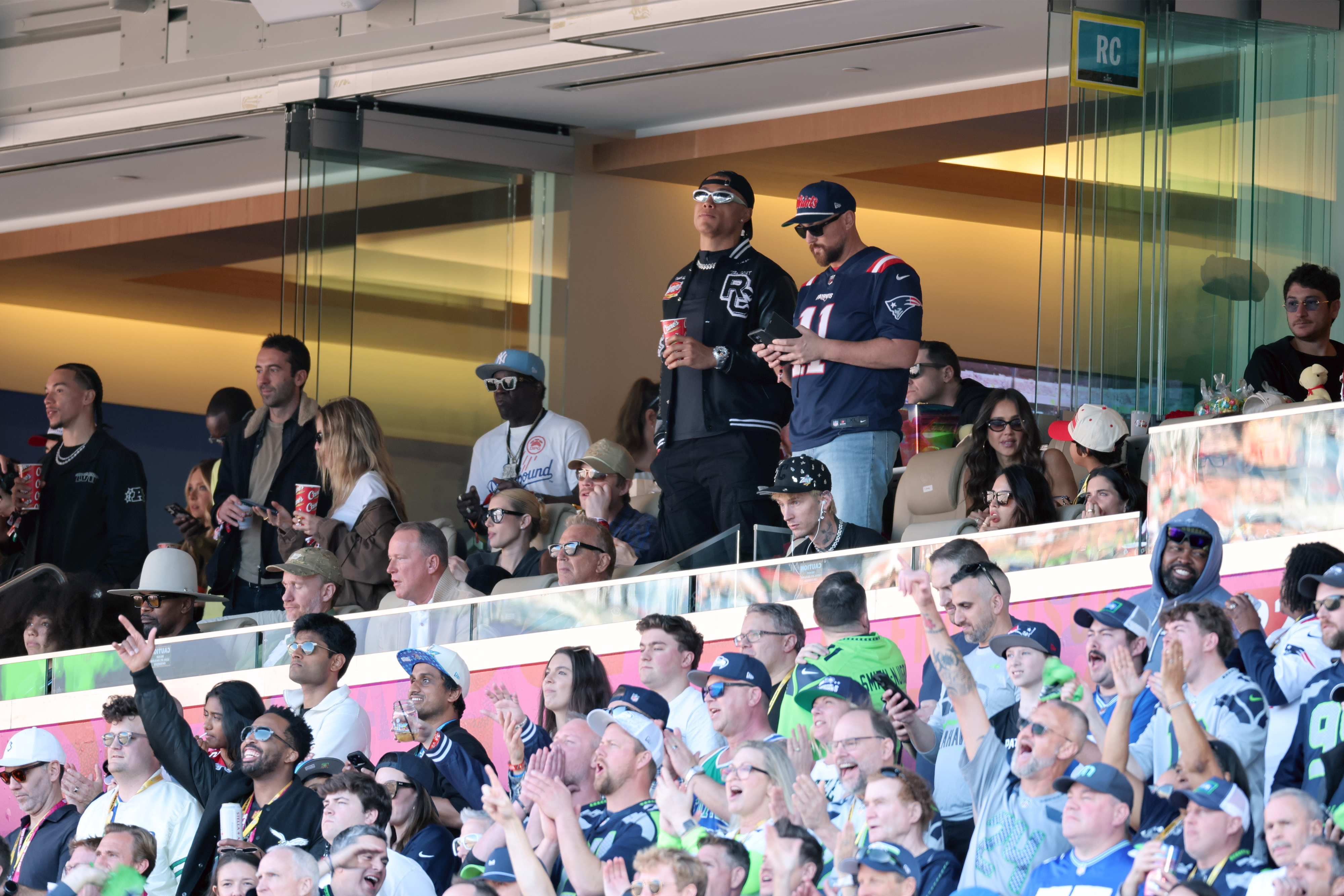 Jamie Foxx, Mike McGuiness, kevin Costner, Chase DeMoore, mgk, and Jessica Alba attend the Super Bowl at Levi's Stadium in San Francisco.