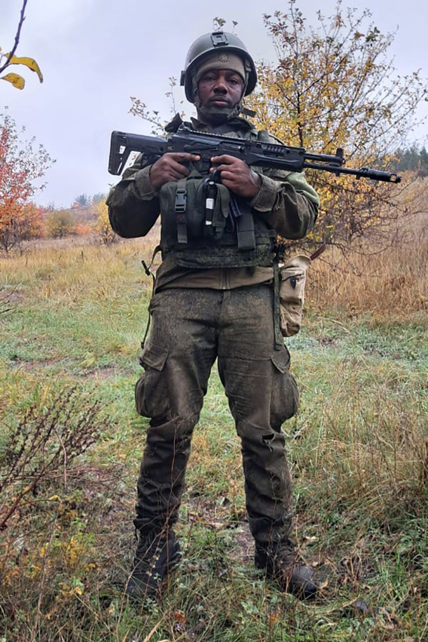 Patrick Kwoba, pictured in military uniform, says he was injured while deployed to Ukraine.