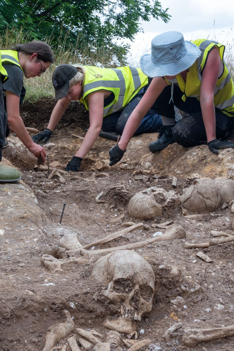 Six skulls were found on top of the bodies.