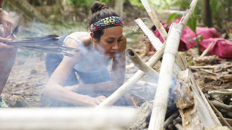 Angelina starting a fire on Survivor 50