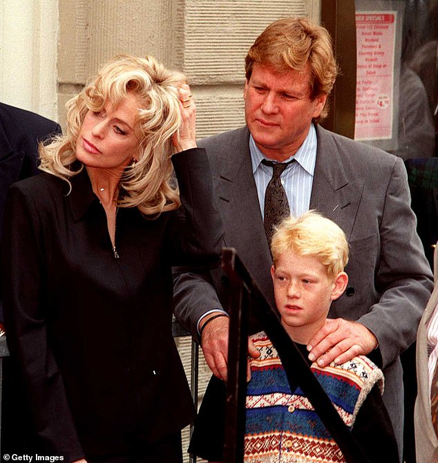 Farrah Fawcett and Ryan O'Neal were in a long-term, on-again-off-again relationship from 1979 to 1997. They are pictured with Redmond in 1995