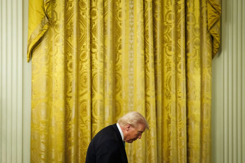 President Donald Trump leaves the East Room of the White House on March 17.