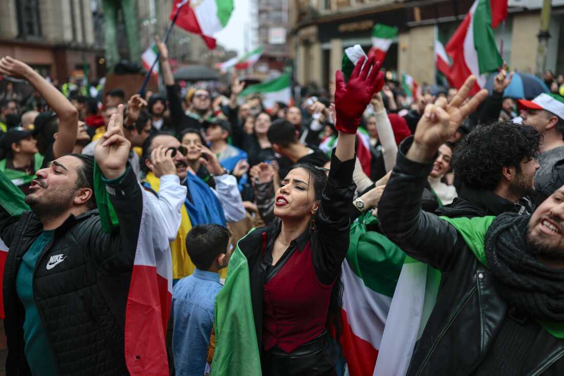 Members of the Iranian community take part in celebrations following the U.S. and Israeli strikes on Iran on March 01, 2026 in Glasgow, Scotland. Iran's Supreme Leader, Ayatollah Ali Khamenei, was confirmed killed after the United States and Israel launched a joint attack on Iran on February 28. Iran retaliated by firing waves of missiles and drones at Israel, and targeting U.S. allies in the region.