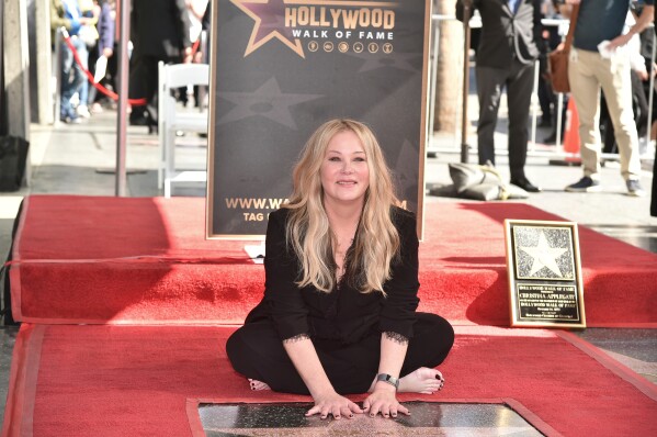 Christina Applegate poses at a ceremony honoring her with a star on the Hollywood Walk of Fame in Los Angeles on Nov. 14, 2022. (Photo by Richard Shotwell/Invision/AP, File)