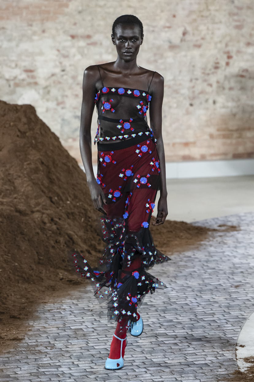 A model walks the runway at the Moschino Ready to Wear Fall/Winter 2026/2027 fashion show during the...