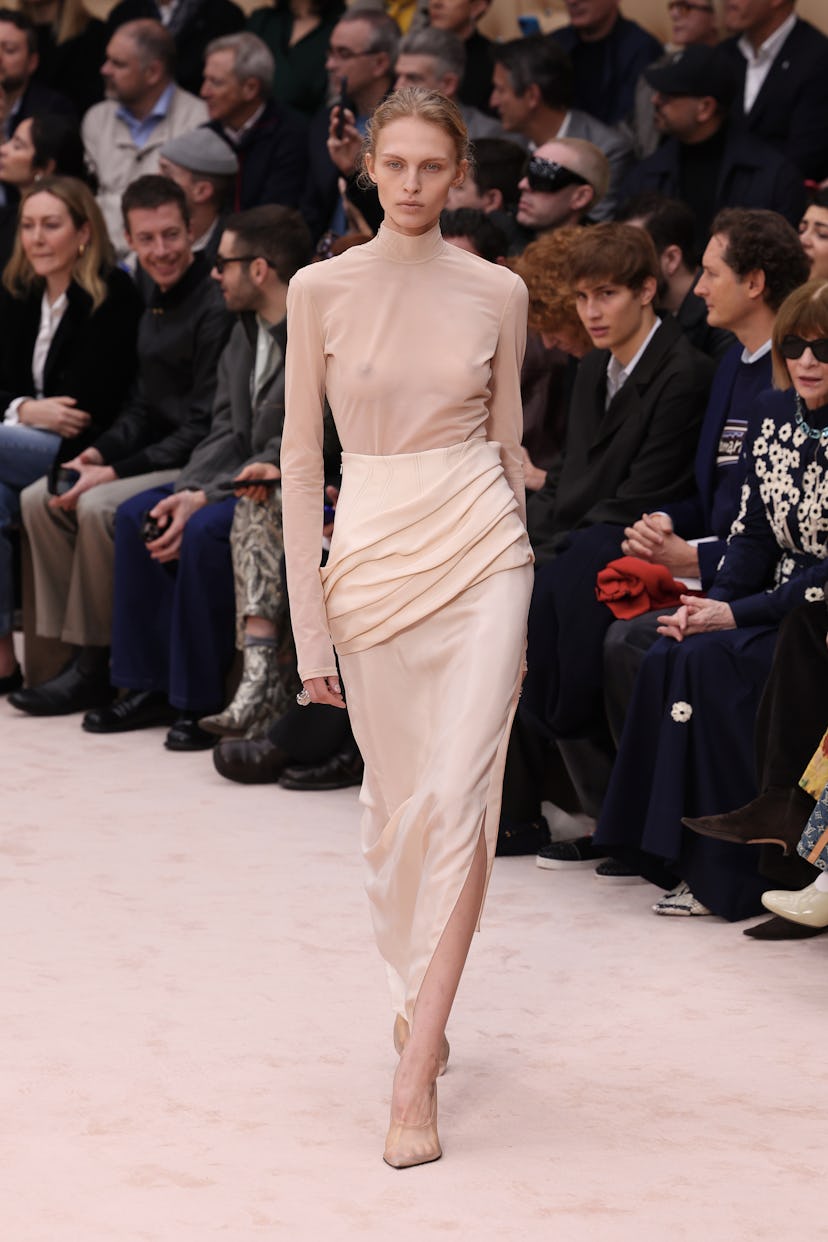 A model walks the runway at the Ferrari fashion show during the Milan Fashion Week - Womenswear Fall...