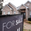 A for-sale sign stands outside a home in Nashville, Tennessee, on February 10.