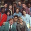 The cast of NBC's Saturday Night Live pose on the show's set in New York, in September 1992. From left, front: Chris Farley, Al Franken and Melanie Hutsell. In middle row, from left: Chris Rock, Julia Sweeney, Dana Carvey and Rob Schneider. In back row, from left: Adam Sandler, David Spade, Ellen Cleghorne, Kevin Nealon, Phil Hartman and Tim Meadows.